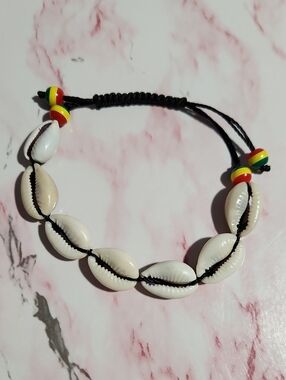 Cowrie Shell Bracelet with Black Cord and Rasta Bead Accents